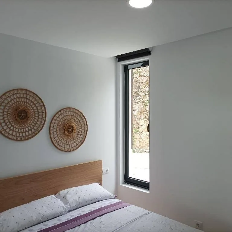 Dormitorio 1 de A Casiña de Cris, casa rural en Boiro (Rías Baixas)